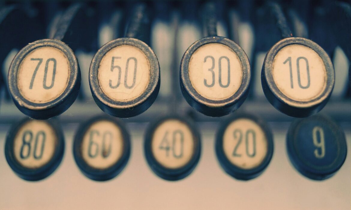 Close-up of a vintage typewriter showcasing numbered keys with a retro feel.